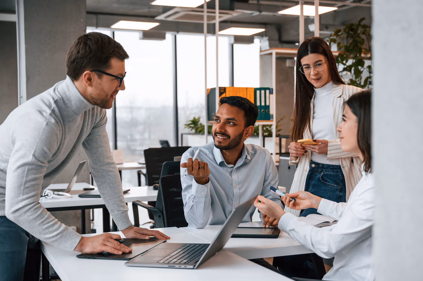 The Riz Finance team working together in their Sydney office
